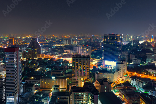 Cityscape at sunset sky by long shutter speed in Bangkok City of Thailand.