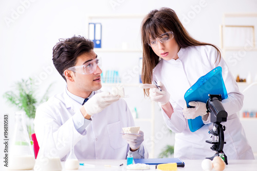 Two lab doctor testing food products