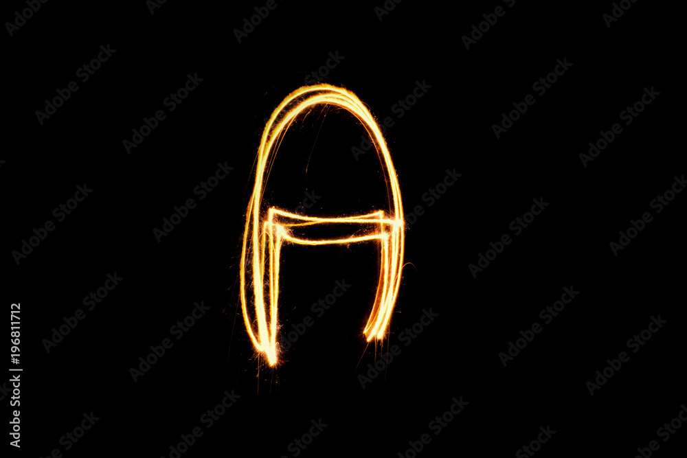 Light painting alphabet A on black back ground . Light painting alphabet A on black back ground .