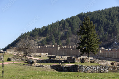 Ruins of the medieval fortress Krakra from the period of First Bulgarian Empire near city of Pernik, Bulgaria photo