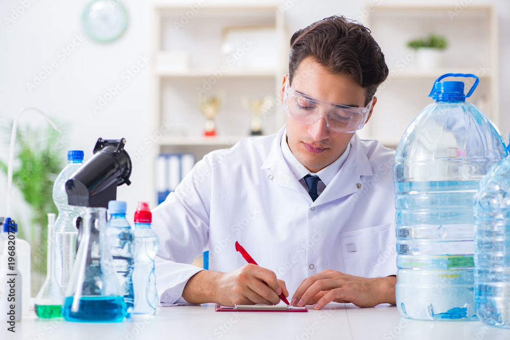 Lab assistant testing water quality Lab assistant testing water quality