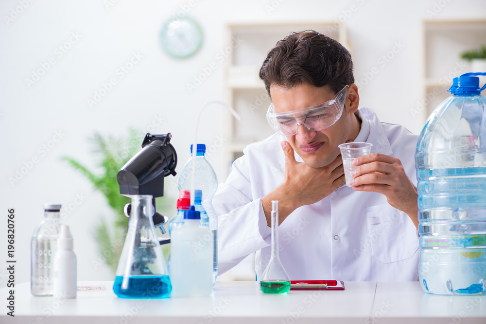 Lab assistant testing water quality Lab assistant testing water quality