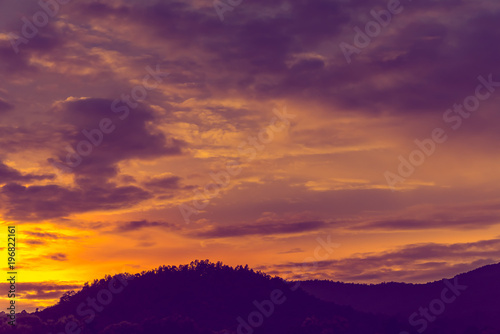 silhouette shot image of mountain and sunset.