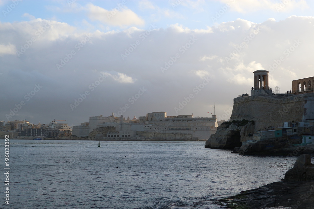 View to Siege Bell War Memorial and fort St Angelo, Valletta, Malta
