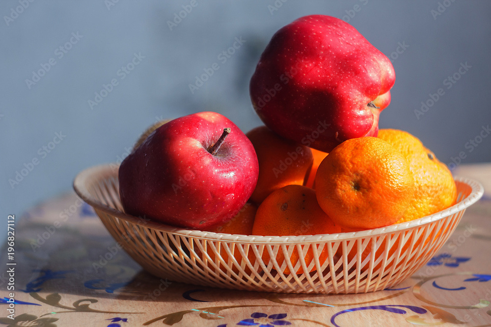 apples orange tangerines fruit basket