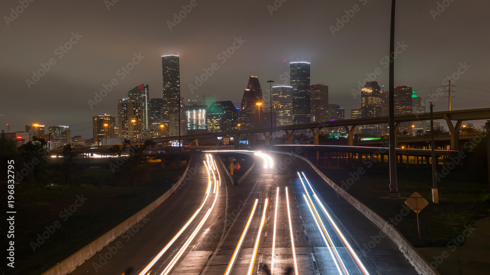 Photo of downtown Houston skyline and traffic at night