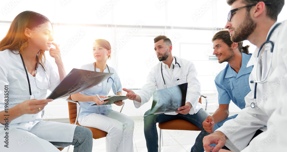 Fototapeta premium medical staff discussing x-ray of a patient