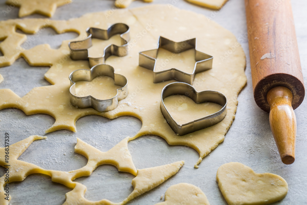 Making tasty milky biscuits on gray table