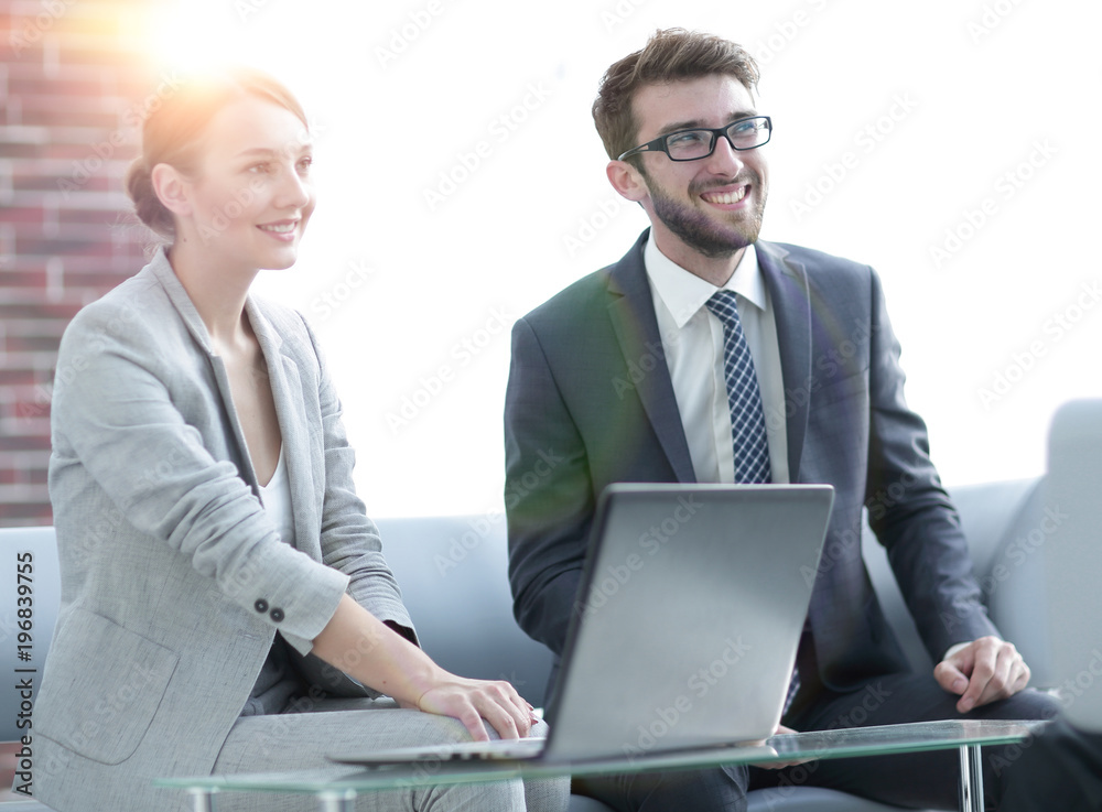 members of the business team talking to a client members of the business team talking to a client