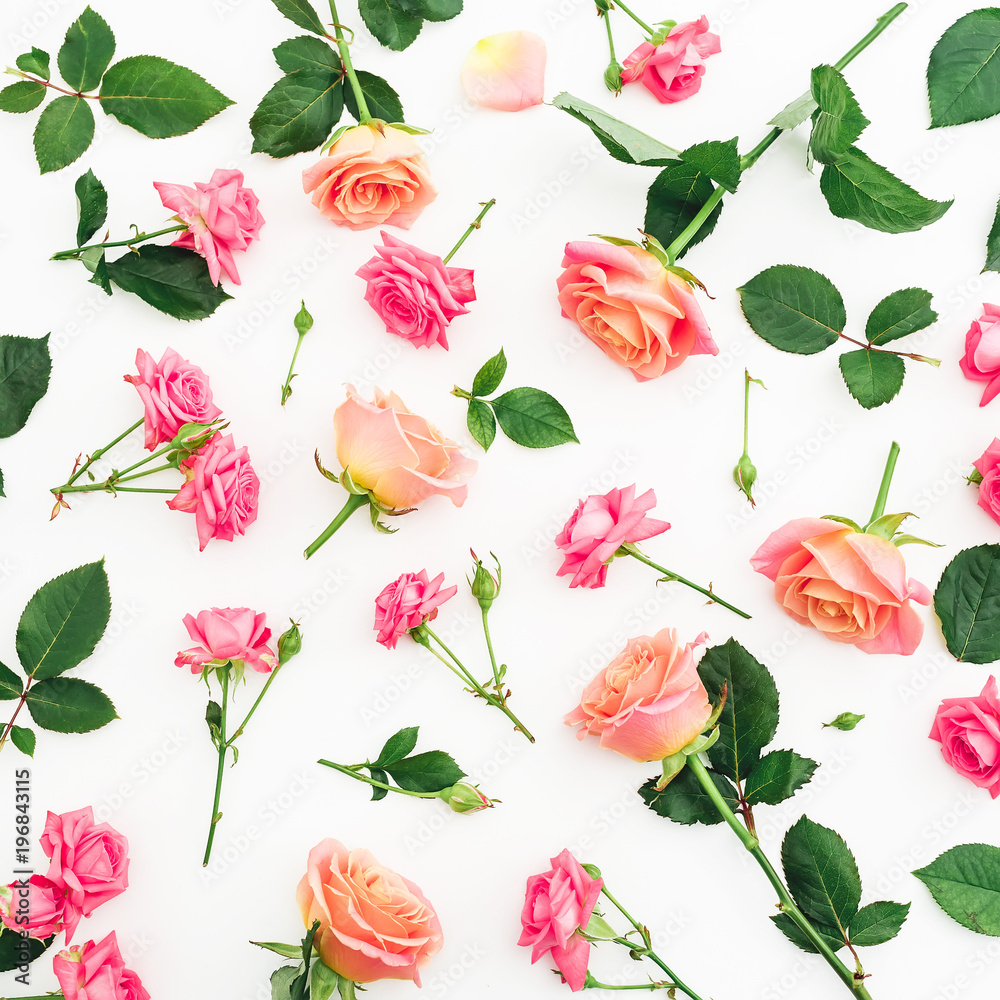 Floral pattern with roses, buds and green leaves on white background. Flat lay, top view. Spring background
