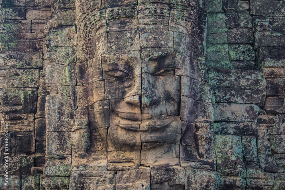 Carved face in Bayon temple, Angkor, Cambodia