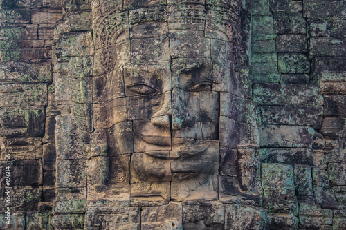 Carved face in Bayon temple, Angkor, Cambodia © Yann