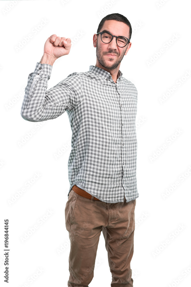 Winner young man with a gesture of challenge Winner young man with a gesture of challenge