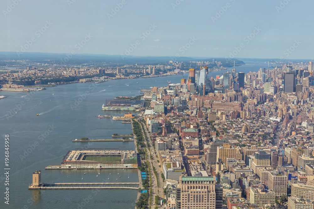 Fototapeta premium Aerial view of Manhattan skyline on a sunny summer day.