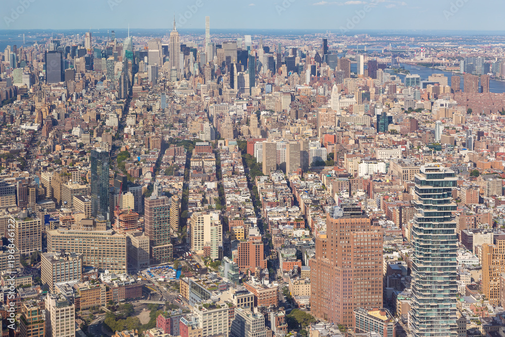 Aerial view of Manhattan skyline on a sunny summer day.