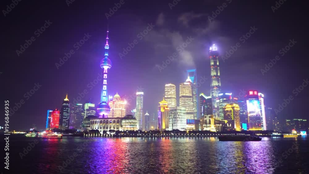 Night view of downtown Shanghai called the Bund, located on the embankment of the river Huangpu Night view of downtown Shanghai called the Bund, located on the embankment of the river Huangpu