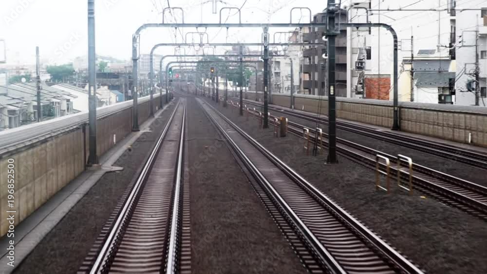線路を走行する電車(スロー) StockVideo Adobe Stock