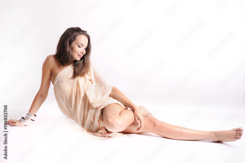 Obraz premium young beautiful dark-haired woman with a shawl.