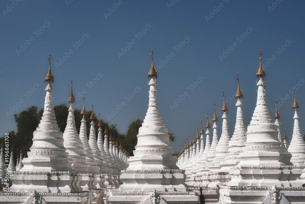 Mandalay, Myanmar - November 24, 2015 : .Very nice and old temple with a lot of white stupa in Mandalay