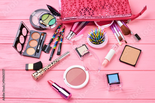 Φωτογραφία Various makeup products on wooden background
