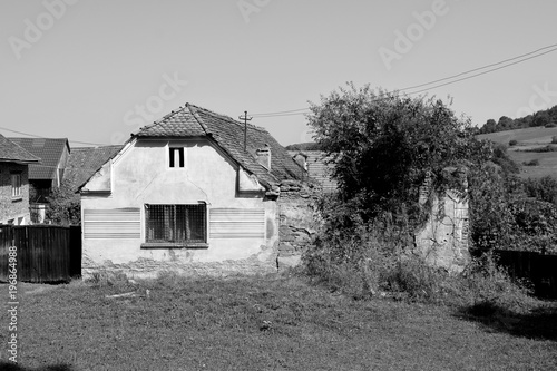 Typical rural landscape and peasant houses in  the village Somartin, Martinsberg, Märtelsberg, Transylvania, Romania. The settlement was founded by the Saxon colonists  photo