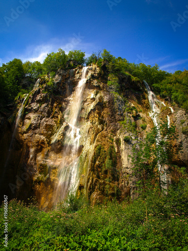 Tall waterfall in The Plitvice Lakes National Park