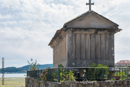 Horreos, traditional galician granary in Combarro. Galicia, Spain photo