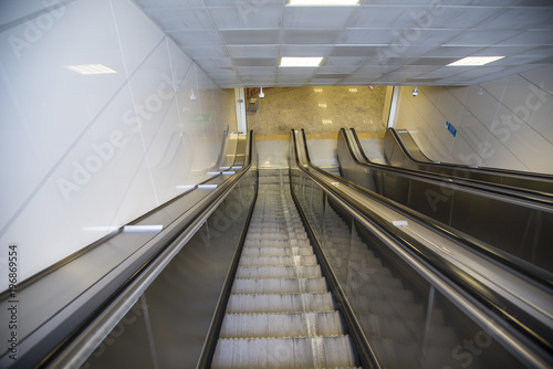 Empty Escalator to the subway with no people
