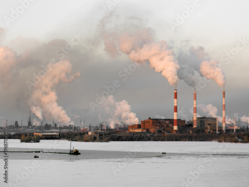 The smoking pipes of the metallurgical plant in the industrial city