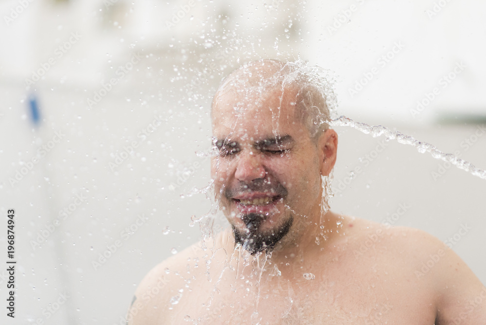 Fresh water falling to fresh man in summer scene Fresh water falling to fresh man in summer scene