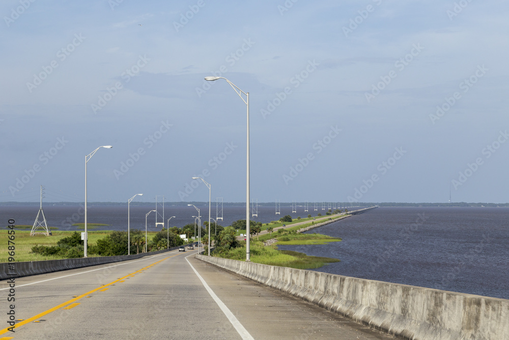 coast street in Apalachicola with bridge to island