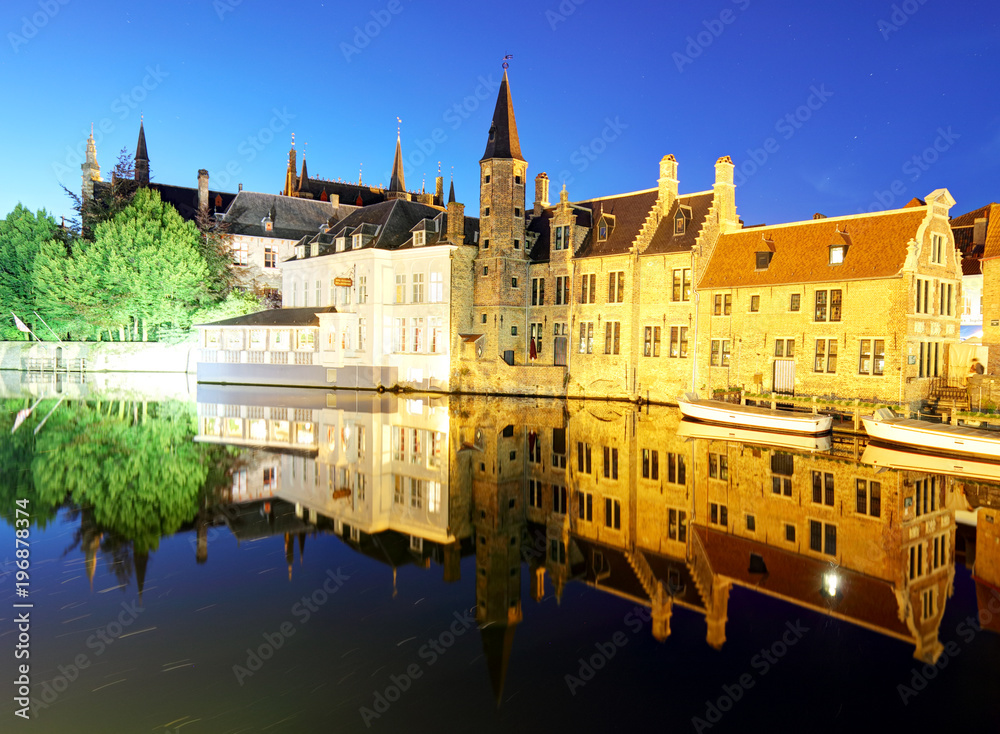 Belgium - Historical centre of  Bruges river view. Old Brugge buildings reflecting in water canal.