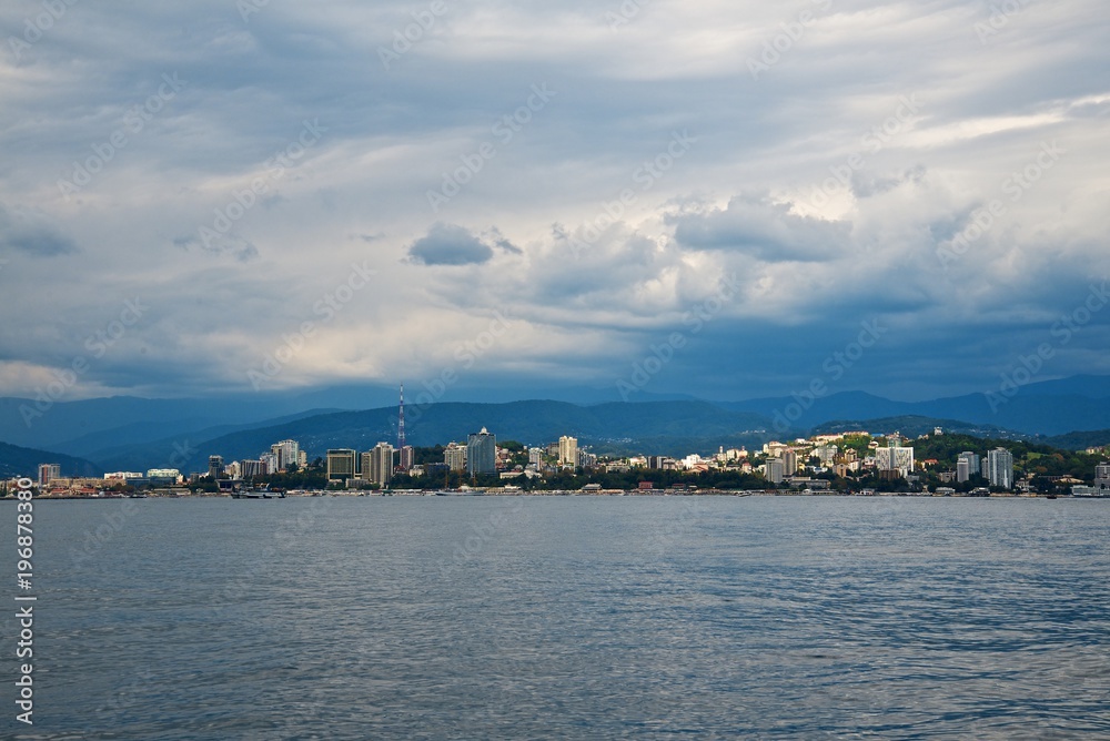 Seaside of the Sochi city. High buildings on the coast. Beauty sky clouds. Seaside of the Sochi city. High buildings on the coast. Beauty sky clouds.