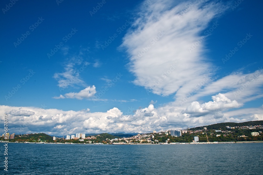 Coastal area of the city of Sochi. High houses by the sea. View from the sea.