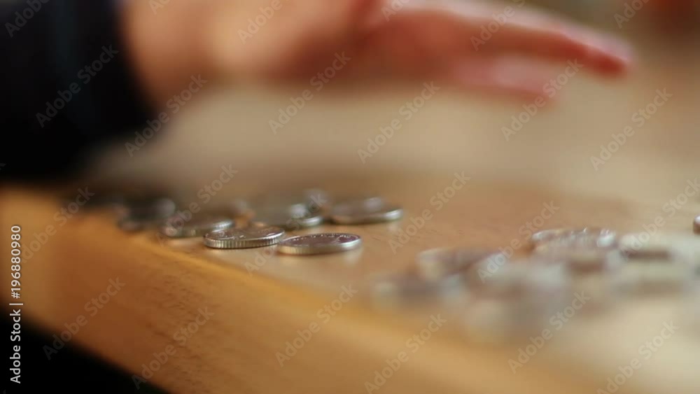 Boy playing with money