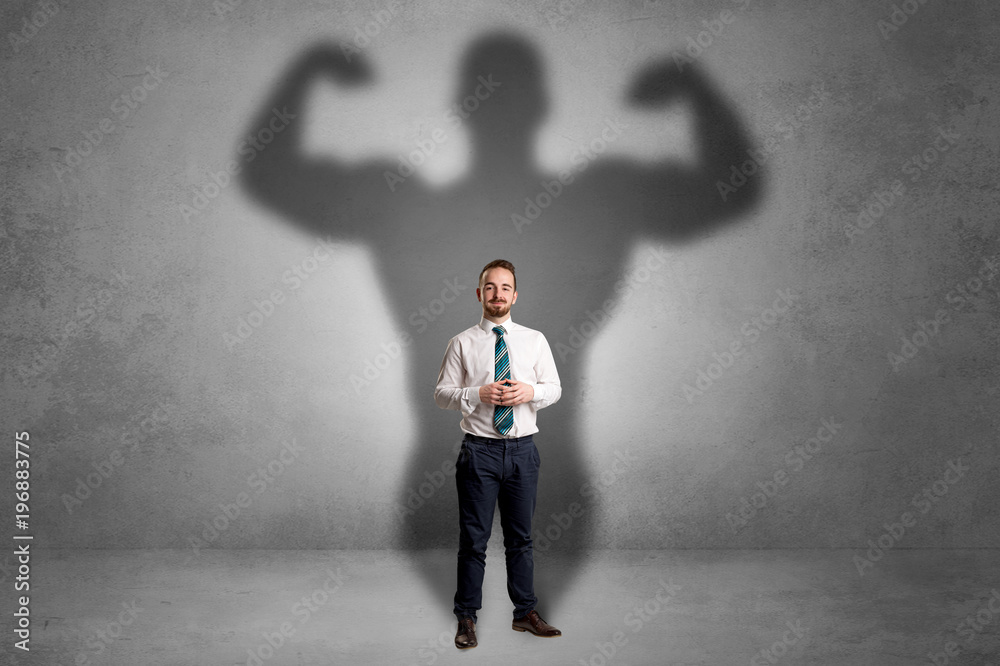 Businessman with muscular shade behind his back Businessman with muscular shade behind his back