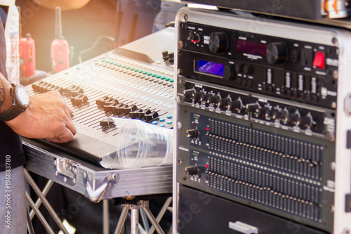 Cuadro en lienzo DJ are using their hands to adjust the volume and test the sound to the standard