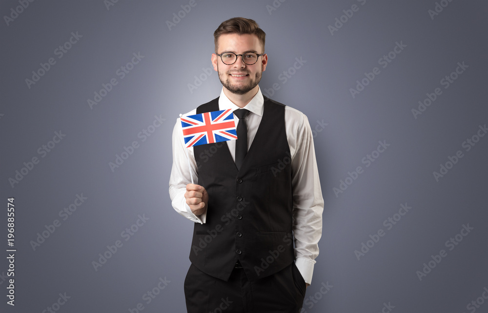Handsome student standing with national flag Handsome student standing with national flag