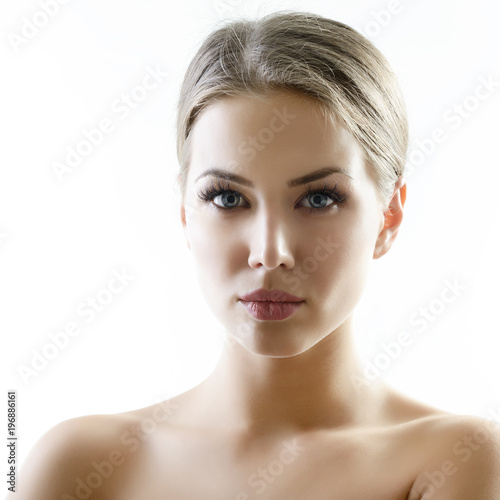 Beauty portrait of young woman with beautiful healthy face, studio shot of attractive girl over on white background