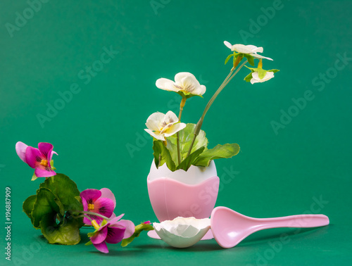 Foto Still life with flower growing out of an eggshell