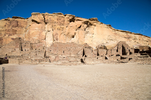 Rock wall and ancient ruins of Chaco Canyon in New Mexico