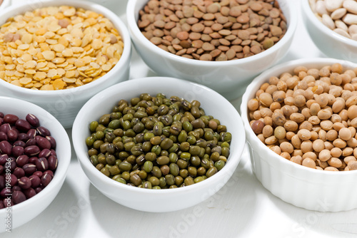 assortment of various legumes in bowls
