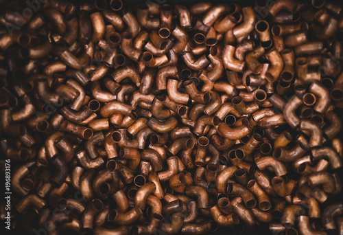 Texture or background of industrial copper pipes