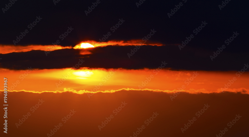 Beautiful sunset with colorful clouds on the sky Beautiful sunset with colorful clouds on the sky