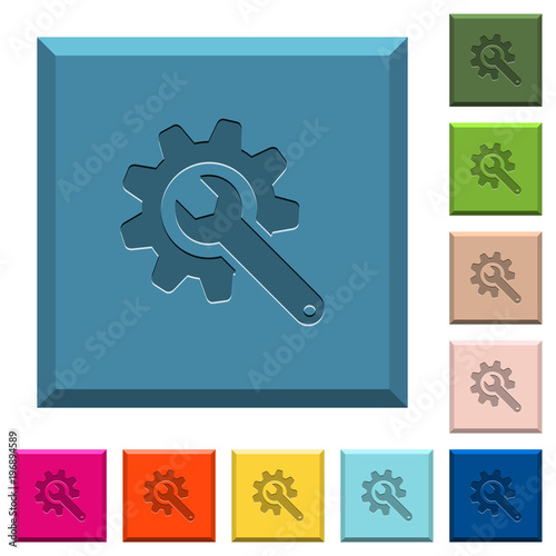 Wrench with cogwheel engraved icons on edged square buttons
