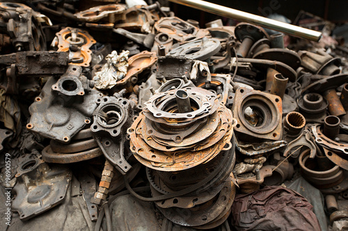 Dump of pieces of iron and wrecking machinery parts. Thailand, Bangkok, China Town. 