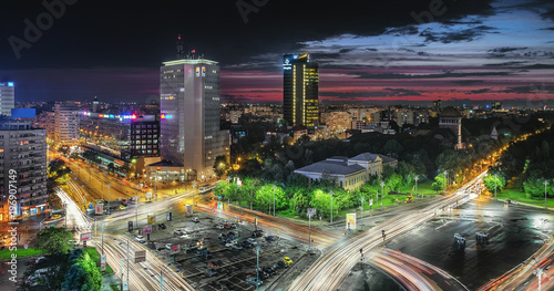 Aerial view of the business district in the Victoria Square. Night lights after a storm, sunset in Bucharest, Romania.