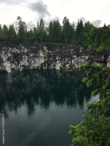 marble canyon in Karelia, a lake in the middle of marble mountains, picturesque places of Karelia photo