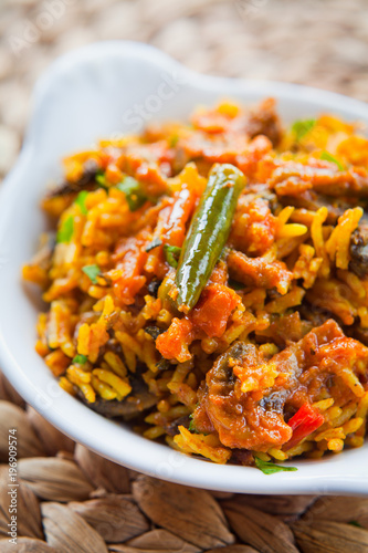 Indian Mixed Vegetable Biryani -  Fried rice with rich Indian Curry photo