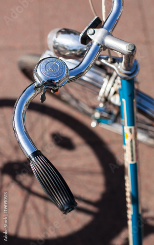 Top Shot of the Handle Bar with Bike Bell of a blue Retro Bike